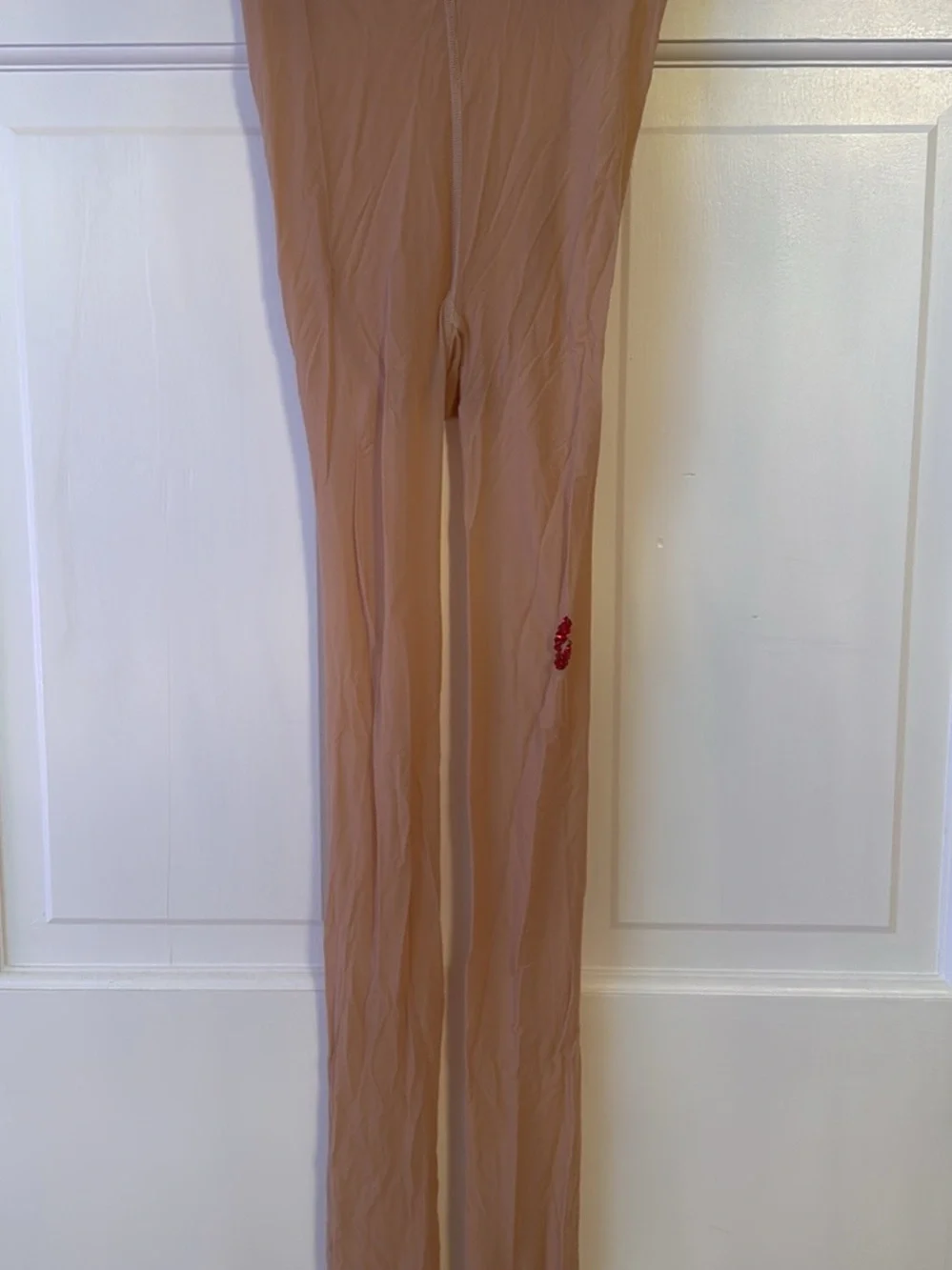 Sabrina Carpenter inspired nude tights with rhinestone kiss